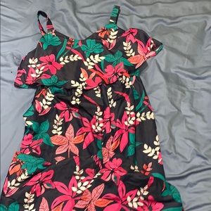 A cute brand new maternity romper